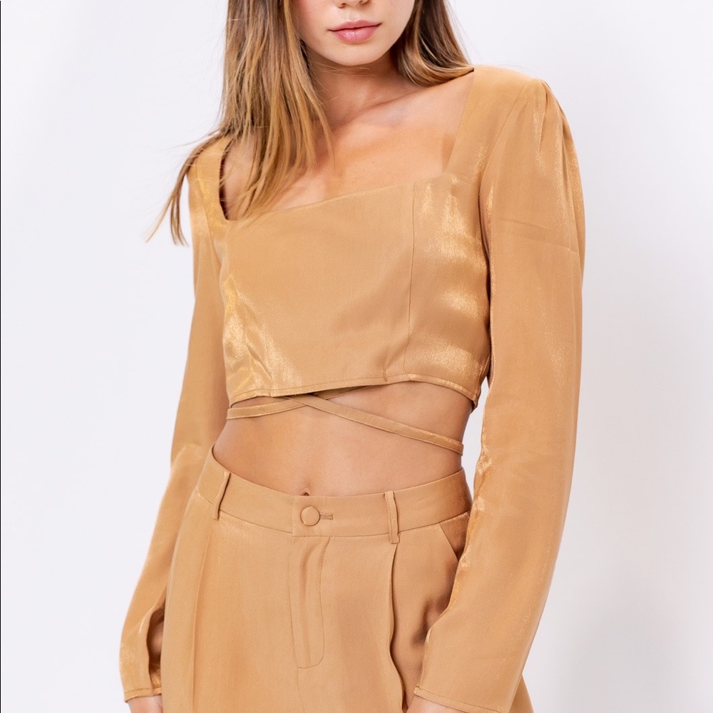 Woman’s shimmering muscular pants with top